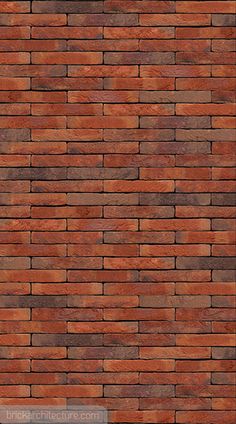 a red brick wall that is very close to the ground