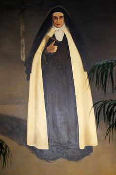 a painting of a nun standing in front of a palm tree with her hand on her hip