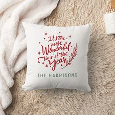 a white pillow with the words it's the most wonderful time of the year on it