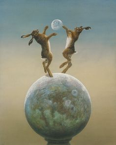 two rabbits are jumping off the top of a large ball with a moon in the background