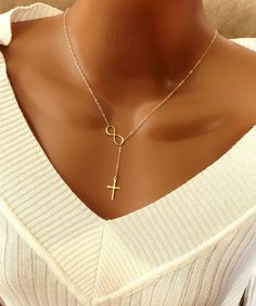 "Handmade with love! PERSONALIZED NECKLACE, CUSTOM JEWELRY, PERSONALIZED GIFTS. Infinity cross lariat necklace is gift ideas for Mom, Grandma, Daughter, Sister, Bridal shower, bridesmaids, Christmas, baptism, mother, grandma, birthday, wedding.... MATERIALS: - Gold Plated chain and components. - Gold Plated Infinity size 8.3mm x 19.1mm. - Gold Plated Cross size 11.6mm x 20.6mm. - Model is wearing a 18\" inches necklace from end to end. - Silver Plated chain and components. - Sterling silver infi Elegant Cross Lariat Necklace, Party Necklaces As Gifts, Gold Cross Lariat Necklace As Gift, Elegant Cross Lariat Necklace For Gift, Elegant Cross Lariat Necklace Gift, Elegant Cross Lariat Necklace As A Gift, Cross Lariat Necklace Gift, Valentine's Day Wedding Cross Jewelry, Adjustable Cross Lariat Necklace Gift