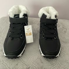 Brand New. Never Worn. Winter Slip-resistant Sneakers With Round Toe, Casual White Waterproof Winter Boots, Casual White Waterproof Boots For Winter, White Non-slip Winter Boots, Non-slip White Winter Boots, Sporty White Lace-up Waterproof Boots, Weatherproof Black Round Toe Sneakers, Winter Waterproof Sneakers With Round Toe, Waterproof Winter Sneakers With Round Toe