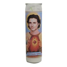 a candle with the image of jesus on it