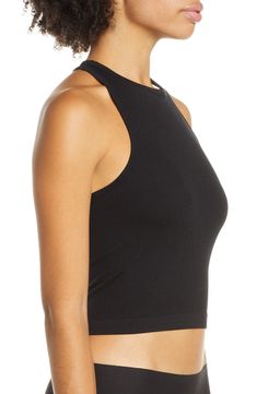 Lounge or layer in this oh-so-versatile ribbed crop top that looks (and feels) great wherever you go. 17" length (size Medium/Large) Crewneck Sleeveless Racerback 92% nylon, 8% spandex Machine wash, dry flat Imported Seamless Crop Top Tank For Layering, Spring Ribbed Crop Top With Medium Support, Versatile Medium Support Crop Top, Fitted Cropped Seamless Tank Top, Black Cropped Crop Top For Yoga, Versatile Cropped Tank Top With Built-in Bra, Ribbed Tank Crop Top For Workout, Chic Workout Crop Top, Spring Cropped Tops With Medium Support