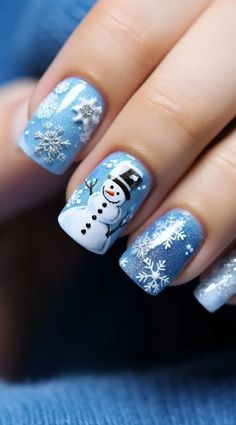 Winter Nails With Snowman, Blue Xmas Nails Designs, Christmas Gel Nail Art, Snowman Nails Christmas, Nail Christmas Designs Xmas, Blue Snowman Nails, Snowmen Nail Designs, Winter Gel Nail Designs, Christmas Nail Designs Blue