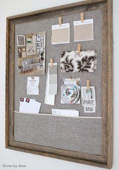 a bulletin board with papers, pictures and other things hanging on it's wall