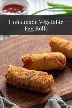 homemade vegetable egg rolls on a cutting board