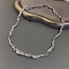 ✦ Upgrade your accessory game with our Stylish Irregular Silver Unisex Chain Necklace. This silver necklace boasts an eye-catching design with irregular-shaped metallic elements, exuding an edgy and contemporary vibe. Suitable for both men and women, this unisex necklace can be worn solo or layered for a personalized and fashionable look. Whether you're looking to add a touch of style to your everyday outfit or searching for a unique gift, this metallic necklace is a great choice for anyone seek Metallic Necklace, Jewelry Details, Basic Jewelry, Versatile Jewelry, Crystal Hoop Earrings, Unisex Necklace, Fashion Jewelry Earrings, Copper Necklace, Everyday Outfit