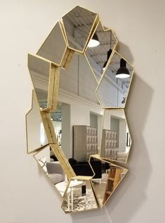 a mirror that is hanging on the wall