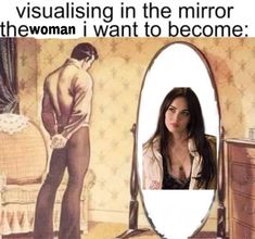 a woman is looking at herself in the mirror, and she's not afraid to see her reflection