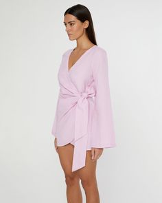 Designed in a mini crossover silhouette, this Air Linen Wrap Dress is cut from a breezy rayon-linen blend, with wide sleeves and a functional side tie. Spring Linen Mini Dress For Brunch, Pink Wrap Dress For Spring, Spring Chic Mini Dress With Tie Sleeves, Spring Daywear Wrap Dress, Spring Wrap Mini Dress With Tie Waist, Feminine Spring Wrap Dress With Tie Waist, Chic Wrap Dress With Tie Fastening For Spring, Spring Brunch Wrap Dress, Spring Linen Wrap Dress