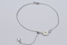 Cute and elegant 925 Sterling Silver daisy flower and cz charms bracelet. Great quality, perfect for a date night or everyday wear. Adjustable from 7 to 8 inches. Free and Fast Shipping Nationwide! Magnetic Earrings, Snake Bracelet, Charms Bracelet, Toggle Bracelet, Jewelry Maker, Rose Gold Earrings, Daisy Flower, Adjustable Bracelet, Charm Bracelets