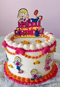 a birthday cake with cartoon characters on it