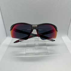 These Sunglasses Are Designed Specifically For Bicycling With A Nice Wrap. Made In Italy And A Great Quality Sunglass. Eye Size 70 Bridge 16 Temple 116 Lenses Are Grey With A Reddish Mirror. Functional Red Sunglasses For Outdoor, Red Shield Sunglasses For Outdoor Activities, Functional Red Polarized Sunglasses, Red Shield Sunglasses With Tinted Lenses For Outdoor, Outdoor Red Shield Sunglasses With Tinted Lenses, Red Shield Sunglasses With Uva Protection, Functional Red Sunglasses With Uv Protection, Red Polarized Sunglasses For Outdoor Activities, Red Anti-reflective Shield Sunglasses For Outdoor Activities