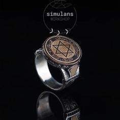 This exquisite Mystic Solomon's Seal Ring is a beautifully crafted piece made from 925 sterling silver. The focal point of the ring features the mystical Seal of Solomon, known for its powerful metaphysical properties. It is believed to have the ability to command and repel metaphysical entities according to the wearer's desires. The sides of the ring are adorned with intricate engravings, hand-carved to perfection, and enhanced with black onyx stones, adding to its mystical allure. The detailed Spiritual Sterling Silver Signet Ring With Gemstone, Mystical Engraved Silver Rings, Mystical Stamped 925 Rings As Gift, Mystical Stamped 925 Rings For Gifts, Vintage Silver Star Of David Jewelry, Mystical Sterling Silver Rings As Gifts, Mystical Sterling Silver Rings For Gift, Handmade Sterling Silver Luxury Engraved Ring, Luxury Handmade Sterling Silver Engraved Ring