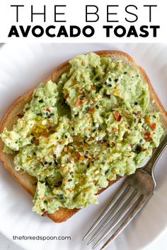 the best avocado toast recipe on a white plate with a fork and text overlay