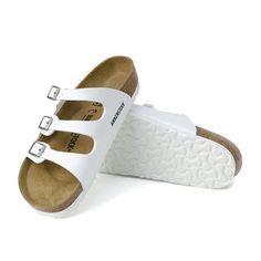 The Florida Birko-Flor Slide Sandal in White from Birkenstock. The BIRKENSTOCK Florida is the ideal sandal for anyone who spends a lot of time on their feet and sets great store by comfort above and beyond the norm. The anatomically formed original BIRKENSTOCK cork-latex soft footbed with built-in permanently elastic latex cushion ensures outstanding comfort that starts on day one. The upper is made of skin-friendly, hard-wearing Birko-Flor®. Anatomically shaped cork-latex soft footbed with inte White Birkenstocks, Florida Woman, Birkenstock Women, Birkenstock Florida, Skin Care Gifts, Crossbody Tote, Signature Style, Christmas List, Slide Sandals