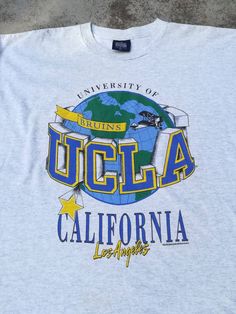 Ucla Shirt, School Merch, Los Angeles Shirt, Sports Tshirt Designs, T-shirt Print Design, California Los Angeles, College T Shirts