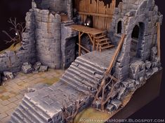 a model of a medieval castle with stairs