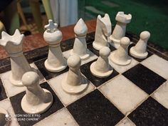 a chess board with white pieces on it