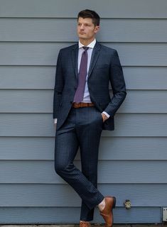 Hunting for a versatile suit can be quite overwhelming. However, our stylish and suave Reda Lapis Blue Checks Wool Suit is a must-have, as it has the power to elevate a simple orthodox outfit into something powerful. Made from high-quality wool fabric, the suit features a striking gingham checkered pattern created with black yarns over classic blue cloth, adding a touch of personality to this timeless design. Whether you are heading to an official meeting or an important gathering, this suit is Orthodox Outfit, Herringbone Tweed Jacket, White Oxford Shirt, Tweed Pants, Blue Tartan, Checked Jacket, Green Suit, Lapis Blue, Beautiful Suit