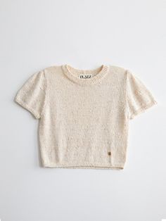 Composition : Acrylic 75% / Nylon 25%Color : BeigeCountry of Origin : Republic of Korea Cozy Beige Spring Knit Top, Cozy Beige Knit Top For Spring, Cozy Beige Knitted Tops, Beige Crew Neck Soft Knit Top, Beige Crew Neck Knit Top, Cream Short Sleeve Knit Sweater, Cream Textured Knit Crew Neck Top, Beige Knitted Short Sleeve Sweater, Beige Textured Knit Crew Neck Top