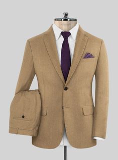 Simplify your next party outfit with the Italian Prima Caramel Wool Suit, perfect for creating a sophisticated, sleek look. Crafted from pure merino wool, it assures comfort and flexibility throughout the day. In addition, the suit's elegant brown hue complements formal events beautifully, making it a stylish and visually appealing choice. 
   
Look features a 2 button jacket with notch lapels, faux horn brown buttons, single vent, two cuff buttons and two welted back pockets on trousers.   
 Yo Brown Wool Suit With Welt Pockets, Tailored Brown Wool Suit, Brown Wool Suits With Suit Collar, Tailored Brown Three-piece Suit With Notch Lapel, Timeless Brown Wool Suits, Formal Brown Three-piece Suit With Welt Pockets, Brown Flat Front Suits For Formal Occasions, Wool Suits With Notch Lapel, Fitted Solid Suits For Fall