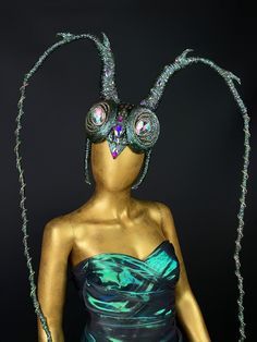 Luxurious, unique unisex headdress green chameleon color for the image of a Bee, Fly, Beetle, Mosquito or other Insect. Suitable for Secret Garden Party, Cosplay, Summer Festival, Burning Man. The size of the headdress is universal for an adult. Suitable for a head circumference of 56-60 centimeters (22-24 inches). The size of the product is adjusted with an elastic band that connects the sides of the headband. It sits soft and comfortable on the head and you can dance and move a long time. 100% designed and handmade by our designers ( SETA Design studio in Kyiv).  It will be securely packed in a box. Feel free to contact us if you have any questions.   We accept return. Contact us within 3 days of delivery. Delivery of goods is returned within 7 days from the date of delivery. We do not a Fitted Fantasy Costume Hats For Themed Events, Fantasy Costume Hat For Mardi Gras, Fantasy Mardi Gras Costume Hat, Green Fantasy Costume For Costume Party, Green Fantasy Costume Accessories For Party, Fitted Fantasy Costume Hats And Headpieces For Festivals, Fantasy Costume Hats And Headpieces For Festival Party, Fantasy Costume Hats And Headpieces For Festivals, Fitted Fantasy Costume Hats For Festivals