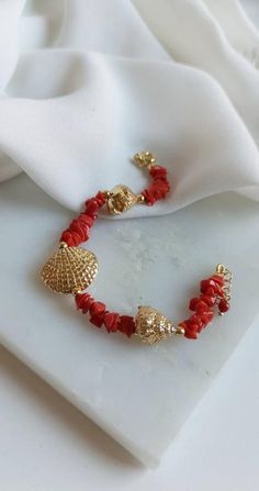 Red Coral Bracelet with Gold plated 925 Sterling Silver Connectors * SHIPPING * Your order will be shipped within 1-3 business days from your purchase. You can choose between 2 shipping methods: STANDARD SHIPPING (without tracking) or REGISTERED MAIL (with tracking). * GIFT PACKAGING * If you want the gift box, you can buy it during your order. We will package your jewel in a pretty, handcrafted package. Thank you for your visit. Elegant Red Bracelets For Beach, Handmade Elegant Red Coral Bracelets, Hand-strung Red Coral Jewelry As A Gift, Hand-strung Red Coral Jewelry For Gifts, Multi-strand Red Coral Jewelry Gift, Handmade Multi-strand Red Coral Jewelry, Coral Bracelet, Red Coral, Gift Packaging