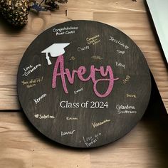 Wood 2024 graduation guestbook personalized with your grads name. If you have a color you'd like to match please message me a picture of the color and I'll match it as close as possible Guestbook comes these size rounds: 12,14,16,18,20 & 22 inches and is laser cut and hand painted black on one side.  I suggest using sharpie brand markers. The gold and silver metallic work great! Guest Book Grad Party, Grad Party Sign In Guest Books, Graduation Laser Cut Ideas, Graduation Wood Signs, Graduation Party Guest Book, Decoration For Party