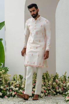 Shop for these amazing collections of Pink Kurta: Raw Silk Embroidered Thread Floral With Bell Bottom Pant For Men by Amrit Dawani online at Aza Fashions. Kurta With Bell Bottoms, Manish Malhotra Menswear Kurta, Bellbottom Pants Outfits Men, White Kurta Pajama Men, Bellbottom Pants Outfits, Kurta Poses, Short Kurta For Men