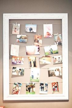 a white frame with pictures hanging on it