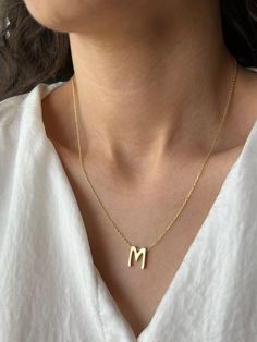 Get the initial of your name to complete your cute style Get this beautiful minimalist jewelry made with the quality of perfect elements✨ You can choose 925K Sterling Silver with the options of Gold, Rose Gold or White Gold colors High quality jewelry for everyone 🤍  Details * 925K Sterling Silver → 14K Gold, Rose Gold or White Gold plated * Chain length is 18 inches / 45 cm * Time is everything! You will receive your package as soon as possible 🚚  * We care about the quality of metal to make sure it will last for a long time * We use enamel technique to color the jewelry and high quality zircons only * There can be tiny differences on each item. Color changes and shade differences of the stones and enamel is possible since each jewelry piece is unique and special * That beautiful piece Simple Initial Necklace In Yellow Gold, Simple Yellow Gold Initial Necklace As Gift, Minimalist 14k Gold Initial Necklace With Custom Name, Modern Yellow Gold Initial Necklace Gift, 14k Gold Initial Necklace Gift, 14k Gold Initial Necklace For Gift, Modern Gold Initial Necklace Gift, 14k Gold Initial Necklace As Gift, Modern Sterling Silver Initial Necklace For Gift