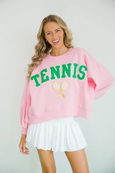 The BREAK POINT PULLOVER is perfect for tennis fans. It features a green varsity "tennis" lettering and a tennis racket patch. It is cut oversized and cropped for a modern look and feel. To maintain the quality, hand washing is recommended. All orders are currently shipping within 14 business days. To receive item quicker, expedited shipping is available at checkout. Tennis Outfit Ideas, Cute Tennis Outfit, Tennis Fits, Tennis Uniforms, Break Point, Tennis Aesthetic, Tennis Style, Bday Girl, Random Ideas