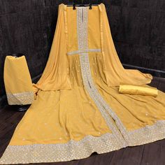 If you are a diva who loves to turn heads wherever you go and this fantastic mustard colored anarkali suit. Shamita shetty looks beautiful in this beautiful suit is prettified with embroidered floral patternson the kameez. The top is made of georgette fabric accompanied with santoon inner and bottom, along with chiffon dupatta. Women can buy this designer suit to wear for their upcoming parties, festivals, wedding functions or engagement ceremonies and occasions, where you want to be center of attraction. Note:- The actual product may differ slightly in color and design from the one illustrated in the images when compared with computer or mobile screen. Yellow Embroidered Anarkali Set In Georgette, Yellow Anarkali Style Floor-length Dupatta, Yellow Anarkali Embroidered Georgette Fabric, Yellow Embellished Floor-length Anarkali Set, Yellow Anarkali With Embroidered Border, Shamita Shetty, Designer Suit, Engagement Ceremony, Beautiful Suit