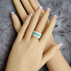 This unique ring, crafted from high-quality Delica beads, is handmade in a boho style. The white base of the ring is adorned with an elegant mint wave, giving it a fresh and stylish look. This ring is perfect for adding a touch of boho charm to your everyday outfit or as an original gift for someone special  Our beaded rings are more than just jewelry; they are expressions of individuality and celebrations of bohemian artistry. Whether you're dressing up for a special occasion or adding a unique Seed Bead Ring, Writing Gifts, Delica Beads, Small Cards, Ring Fit, Beaded Rings, Boho Stil, Original Gift, Boho Rings