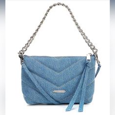 Nwt Rebecca Minkoff Edie Denim Chain Crossbody Bag Color: Denim Style: Hs23eemxde Description: From Rebecca Minkoff, The Edie Denim Chain Crossbody Bag Features: Giving You All The Options. Our Latest Edie Features A Sleek, Palladium Chain Shoulder Strap, Plus A Leather Crossbody Strap For Hands-Free Ease. Crafted From Soft Cotton Denim, It's Detailed With Chevron-Quilting For A Classic Look. 100% Cotton Palladium Hardware Approx. 8.25" W X 6" H X 3.75" D Zip Closure 1 Interior Zip Pocket Import Blue Denim Evening Bags, Rebecca Minkoff Crossbody Bag, Rebecca Minkoff Mini Mac, Grey Crossbody Bag, Snake Skin Bag, Denim Purse, Chevron Quilt, Designer Crossbody Bags, Chain Crossbody Bag