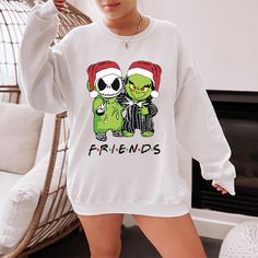 Jack and the Grinch make the best Christmas duo. Such a cute and funny Christmas sweatshirt for the holidays. Get matching sweatshirts for you and your friend. We now use a process to print our shirts that will allow the design to last longer if properly cared for, over 40 washes.In order to provide quick turnaround, we source from four different top clothing brands. If you are needing a specific brand, check with us before ordering for availability.Except for our crop tops, the shirts are UNISE Grinch Christmas Shirt, Matching Christmas Sweaters, Comfy Christmas, Top Clothing Brands, Friends Sweatshirt, Blue Words, Matching Sweatshirts, Top Clothing, Grinch Christmas