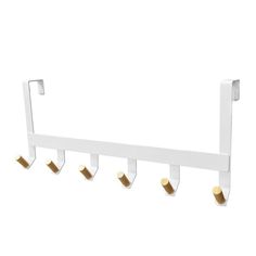 a white wall mounted coat rack with four hooks and three gold knobs on it