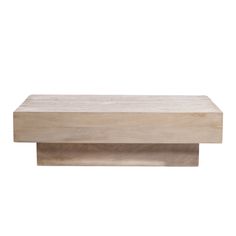 a wooden shelf sitting on top of a white wall