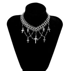 Description:Punk Layered Cross Tassel Collar Choker NecklaceSpecification:Size: 11.8" + 2.7" extWeight: 1.07 oz/pcsMaterial: alloy metal. glass seed beadChain colors: silverFeatures & Details:This punk style cross tassel collar choker necklace is made of nickel-free. lead-free. cadmium-free and hypoallergenic materials. which will not turn your skin green or cause anaphylactic reaction.It is easy to match your different outfits and also suitable for any occasions like wedding. banquet. costume p Halloween Metal Necklace With Adjustable Chain, Punk Metal Chain Necklace For Parties, Punk Style Metal Chain Necklace For Party, Metal Punk Chain Necklace For Party, Punk Style Stainless Steel Jewelry For Party, Punk Stainless Steel Jewelry For Party, Punk Alloy Jewelry For Halloween, Beaded Metal Dangle Chain Necklace, Punk Style Stainless Steel Party Jewelry