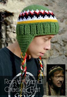 a young man wearing a knitted hat with braids