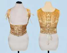 This corset is made out of a gold rose pattern jacquard satin with a poly-cotton liner for comfort and breathability. It's perfect for Renaissance fairs to LARPing adventures! This piece features a lace up front, back and shoulder, poly-boning for structure, golden ribbon and golden grommets. Listing is for Corset only. Sizing: Item will be custom made to your size specifications between sizes XXS-6XL. Variations calls for a separate waist size and corset length because women are made in all different shapes and sizes. Use the sizing chart and guide in the last three pictures to find which size is right for you!  Have questions? Message me for details! Gold Fitted Sleeveless Corset, Gold Fitted Corset With Boned Bodice, Fitted Gold Corset With Boned Bodice, Gold Overbust Corset With Boned Bodice, Metallic Costume, Under Bust Corset, Golden Ribbon, Womens Costumes, Women's Costumes