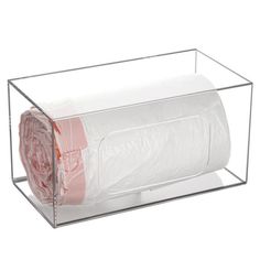 clear acrylic box with roll of toilet paper in it