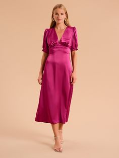 Odette is elegance with an edge. The 3/4 length sleeves are gathered at the bottom to create a feminine silhouette offset with a deep v-neckline. With an open back with sash detail, this dress in deep magenta recycled satin is a date night dream. Odette Dress, Deep Magenta, Feminine Silhouette, British Indian, Denim Top, Holiday Dresses, The 3, Occasion Wear, Open Back