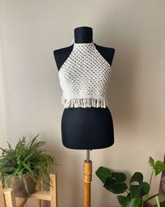 Fitted Bohemian Crochet Top In Cotton Yarn, Fitted Bohemian Crochet Cotton Top, Fitted Bohemian Crochet Top In Cotton, Bohemian Cropped Halter Top For Vacation, White Bohemian Halter Top For Beach Season, Bohemian Cotton Crochet Halter Neck Top, Bohemian Cotton Crochet Lace Halter Top, Fitted Cotton Yarn Crochet Top For Vacation, Summer Festival Cotton Crochet Top