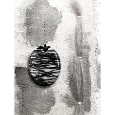 an apple sitting on top of a piece of cloth