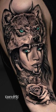 a woman with blue eyes and a wolf's head on her arm is shown