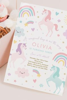 a unicorn themed birthday party with cupcakes and treats