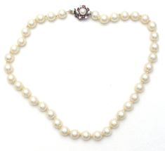 Vintage Fashion Jewelry - This is a strand of hand knotted creamy white glass pearls with a sterling silver clasp. The necklace is 15" long, pearls are 8mm wide, slide in locking clasp has ruby red and clear crystals with side safety clip. Clear Crystals, Creamy White, Ruby Red, White Glass, Clear Crystal, The Necklace, Hand Knotted, Pearl Necklace, Ruby